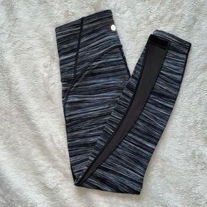Striped gray/black Lululemon leggings with mesh